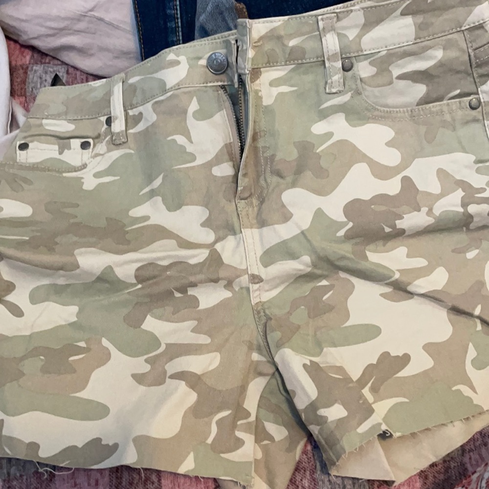 Brand new shirts, size 30, camo.